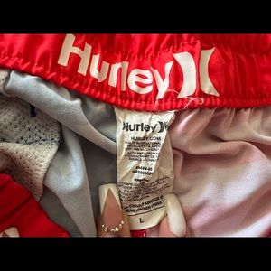 Hurly woman’s board shorts, American flag, large